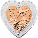 Vzácní jeřábi japonští na atraktivní stříbrné minci ve tvaru srdce - symbol věrnosti, štěstí, lásky a dlouhého života